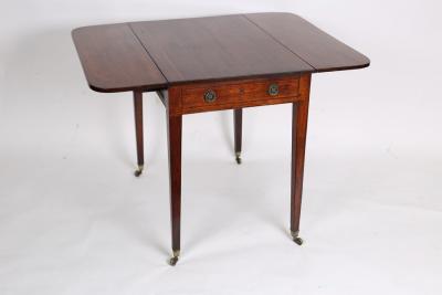 Appraisal: An early th Century mahogany Pembroke table fitted a drawer