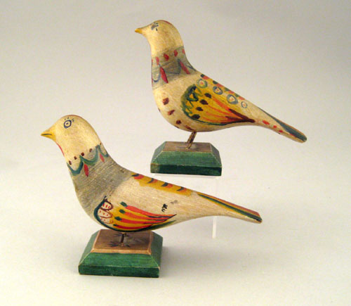 Appraisal: Two carved pine birds late th c retaining their original