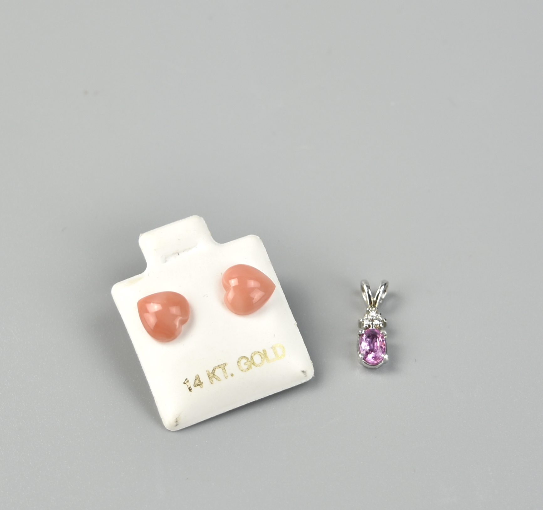 Appraisal: PAIR OF KT CORAL EARRINGS PINK TOURMALINE PIECE A Pair