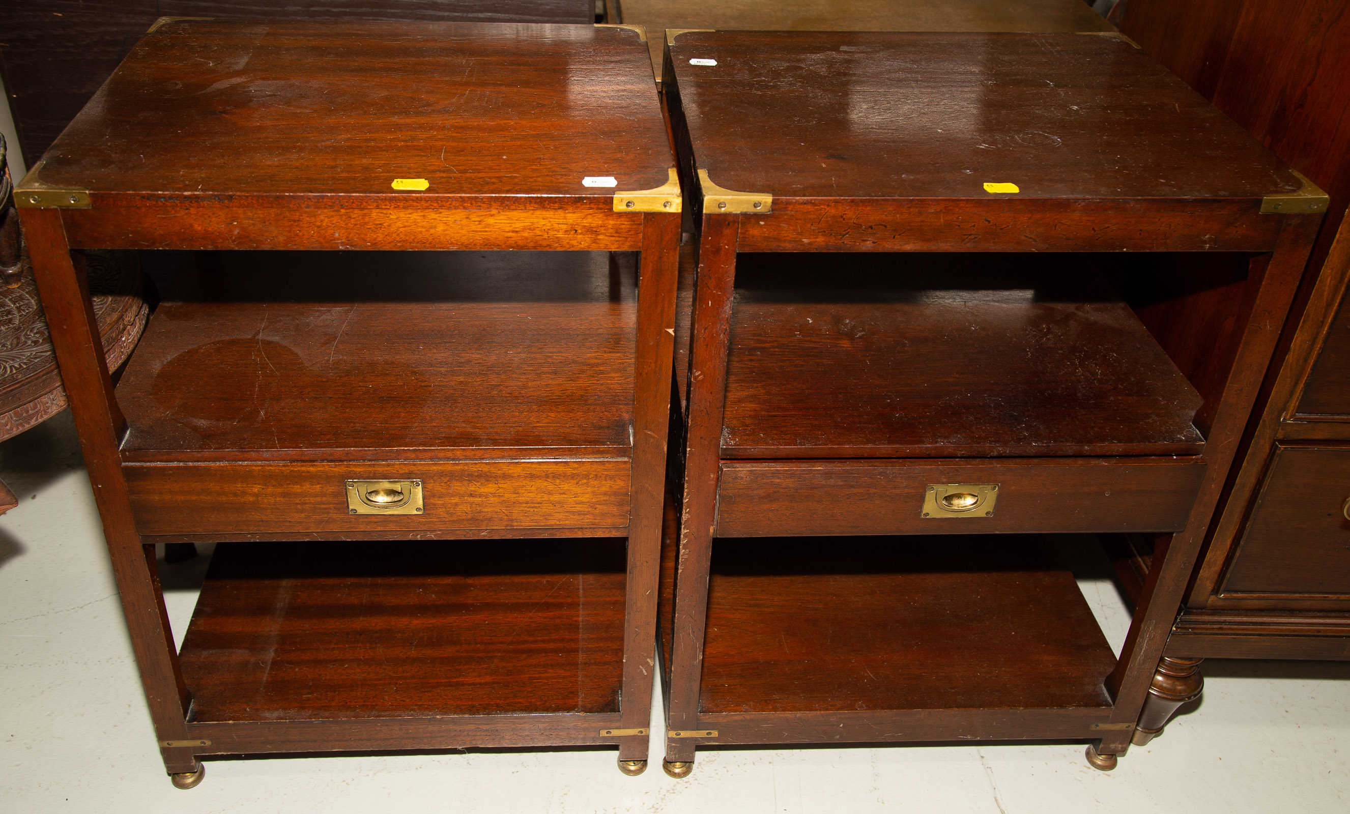 Appraisal: A PAIR OF CAMPAIGN STYLE MAHOGANY END TABLES Bench made