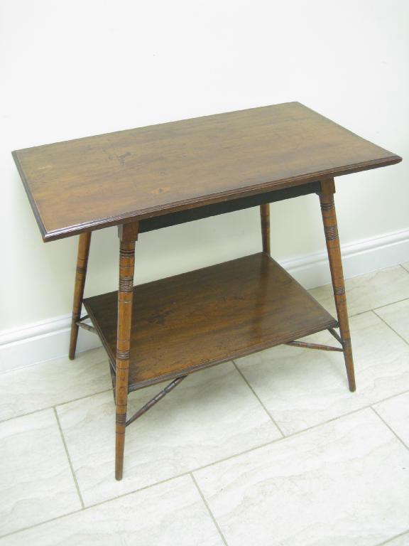 Appraisal: An Aesthetic Movement walnut rectangular Occasional Table on turned legs