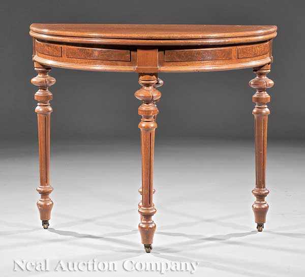 Appraisal: An American Renaissance Carved and Burled Walnut Demilune Games Table