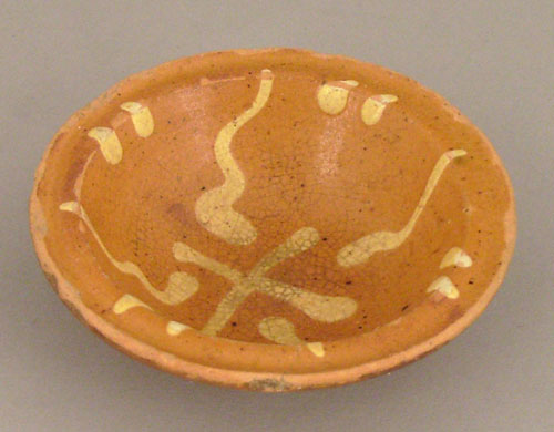 Appraisal: Miniature redware bowl inscribed ILS with yellow slip decoration h