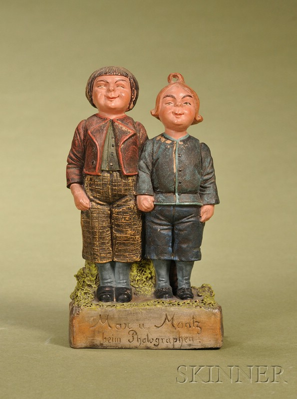 Appraisal: Max and Moritz Figurine Germany c painted terra-cotta figure of