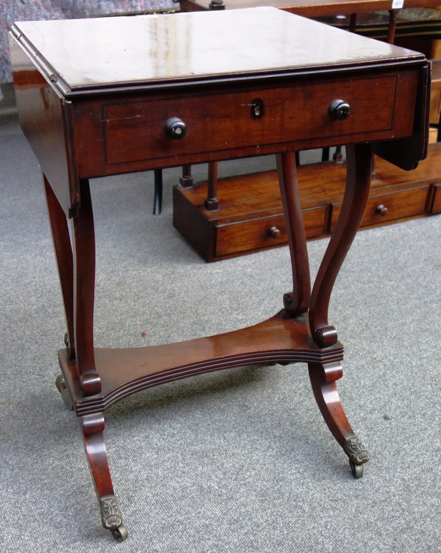 Appraisal: An early th century drop flap wash table with single