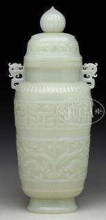 Appraisal: JADE COVERED VASE China th century The vase carved from