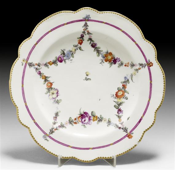 Appraisal: PAIR OF PLATES WITH GARLAND AND BAND DECORATION ZURICH CIRCA