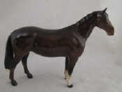 Appraisal: A ceramic Beswick horse chestnut with long tail white blaze