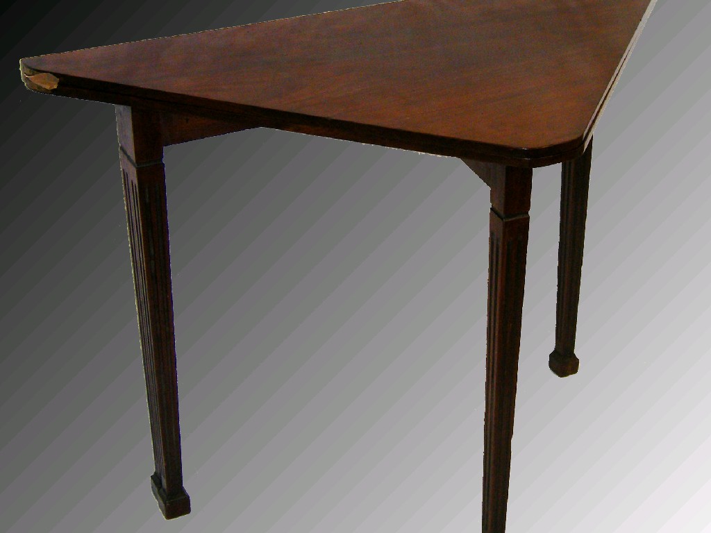 Appraisal: Good th century mahogany fold-over handkerchief table supported upon square