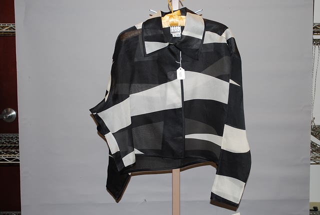 Appraisal: Paula Hian black white silk long sleeve geometric print sheer