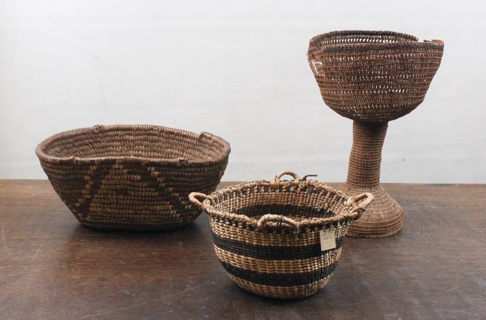 Appraisal: THREE NORTHWEST NATIVE AMERICAN BASKETS Salish oval coil basket decorated