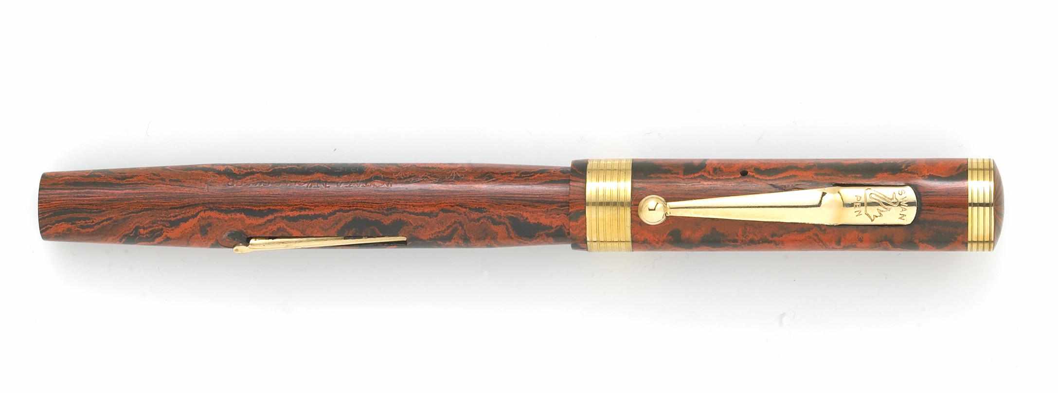 Appraisal: SWAN Red Mottled Hard Rubber Fountain Pen Red mottled hard