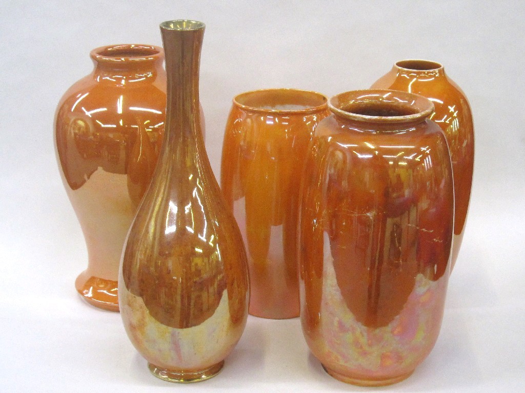 Appraisal: Five orange lustre vases to include Moorcroft Ruskin Royal Doulton