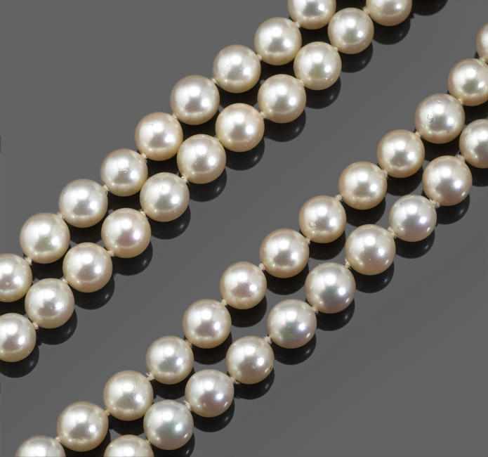 Appraisal: Two cultured pearl necklaces accompanied by a diamond shortener cultured