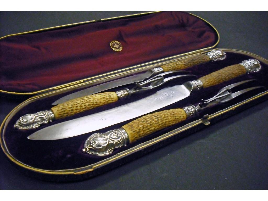 Appraisal: Victorian cased horn and silver handled serving cutlery set to