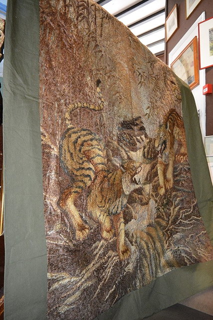 Appraisal: Japanese embroidered wall hangingprobably Kyoto School two snarling tigers on