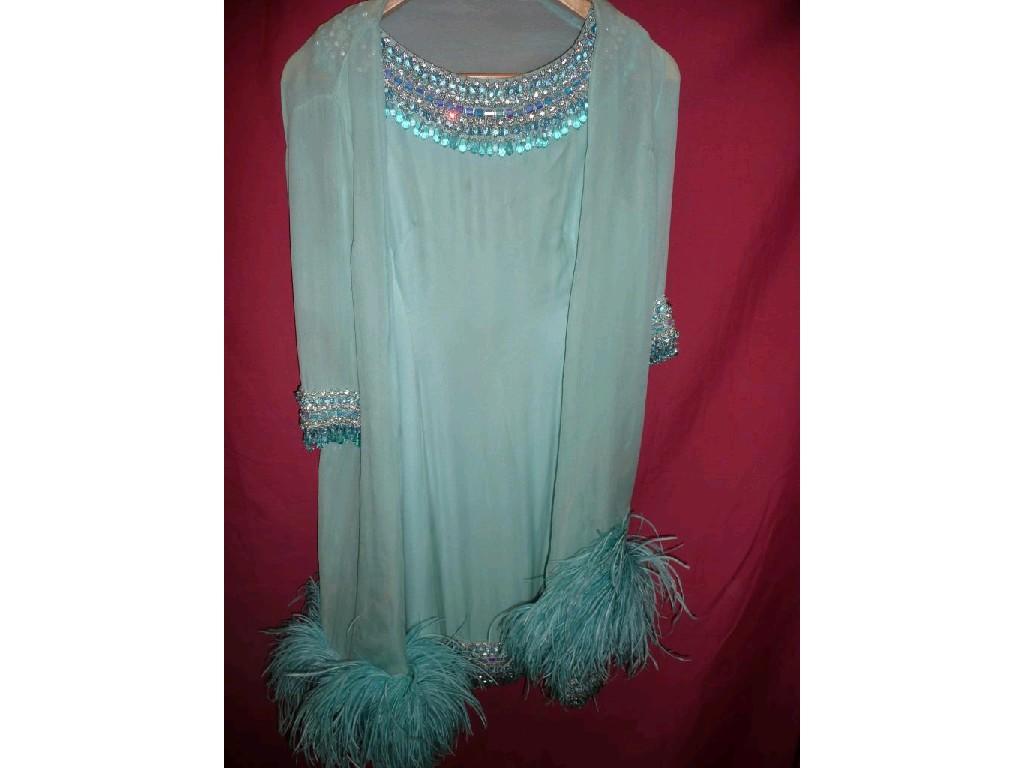 Appraisal: A Rahvis glamorous turquoise cocktail dress B with matching chiffon