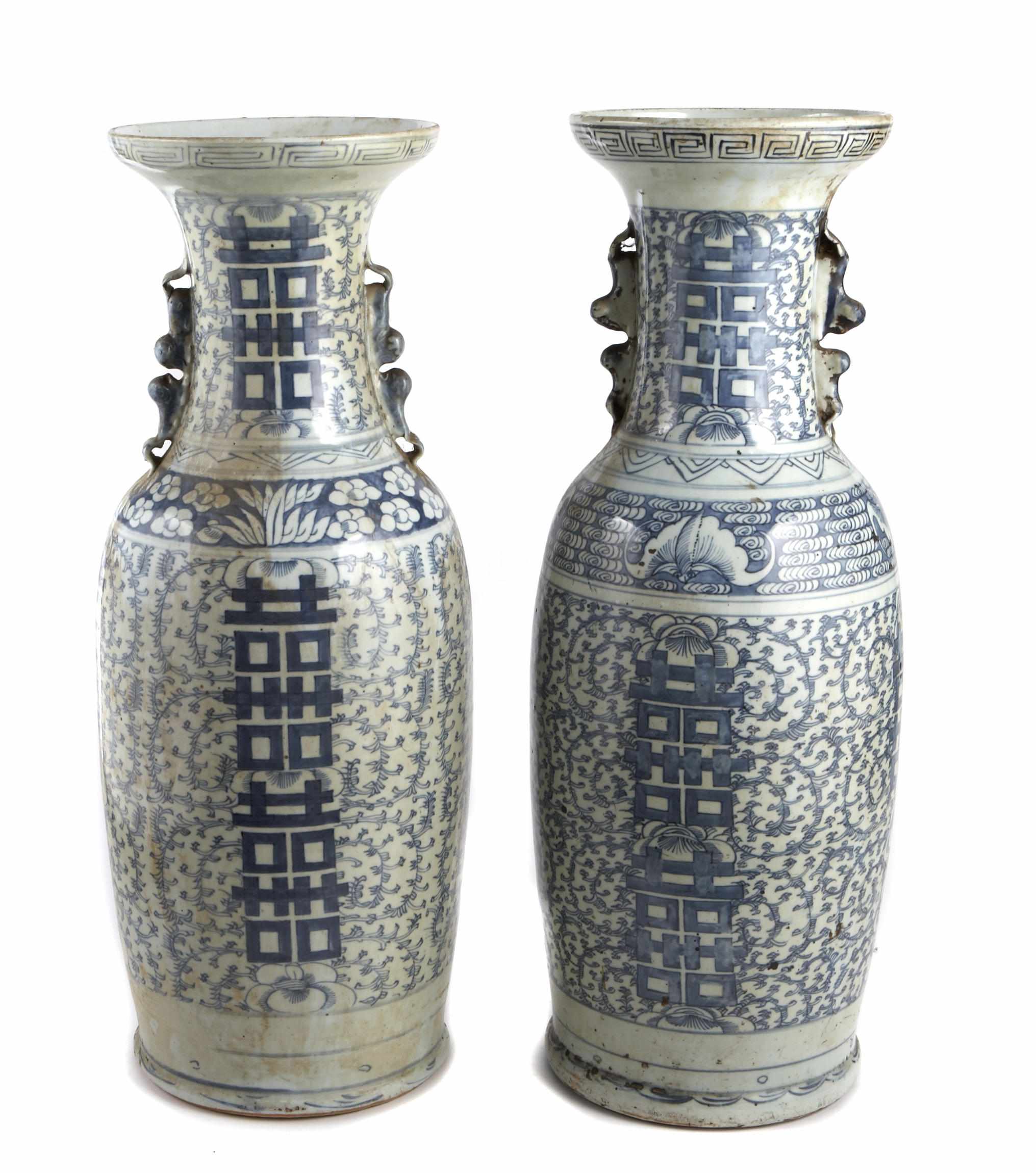 Appraisal: A pair of Chinese blue and white porcelain baluster vases