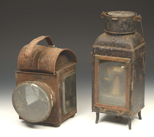 Appraisal: A BLACK PAINTED SQUARE SECTION OIL LAMP with single glass