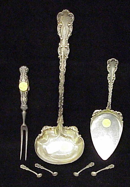 Appraisal: SILVER Whiting Louis XV pattern punch ladle l pie server