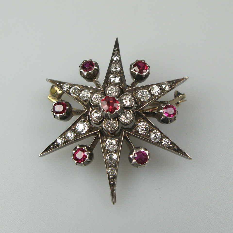 Appraisal: k Yellow Gold And Silver Starburst Brooch set with old