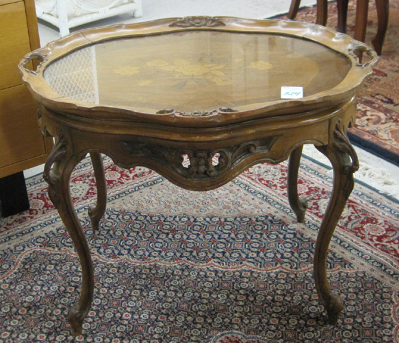 Appraisal: A CARVED AND INLAID WALNUT TRAY-TOP TEA TABLE American c