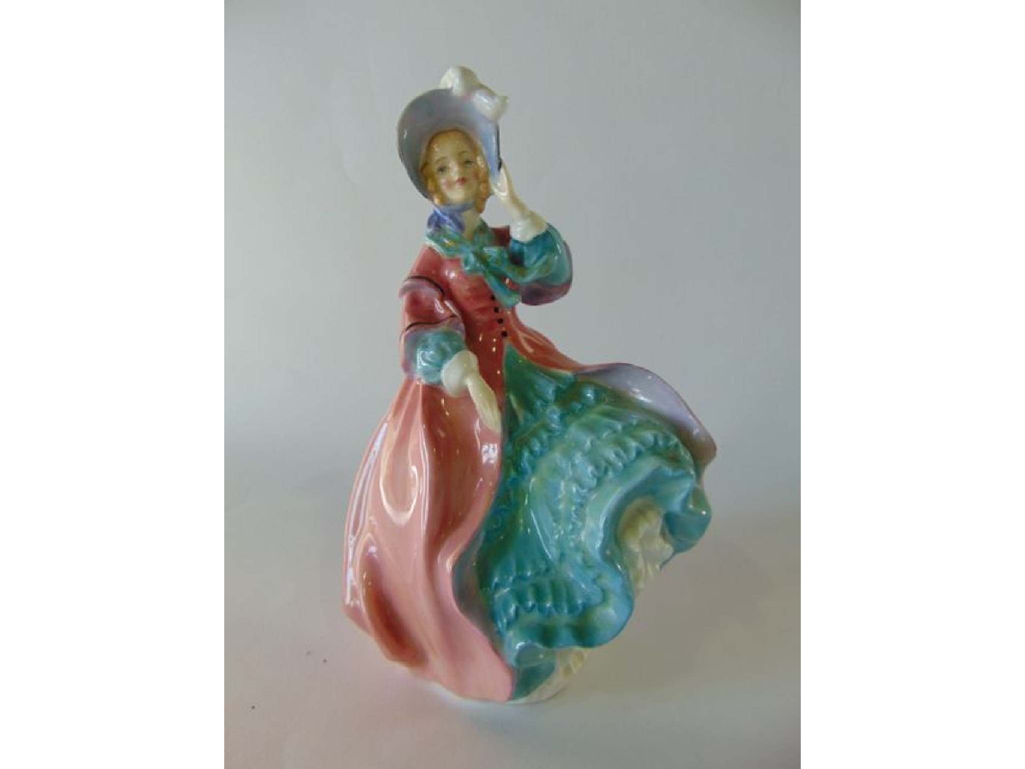 Appraisal: A Royal Doulton figure - Spring Morning HN together with