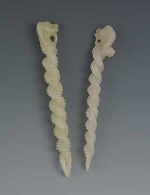 Appraisal: Two Finely Carved Jade Ornaments Both carved with twist design