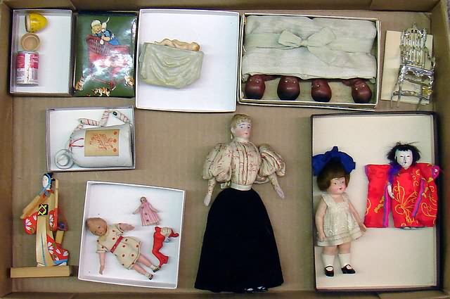 Appraisal: Lot of minis Dolls - German lady with molded bun