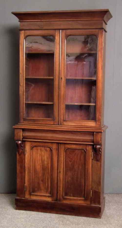 Appraisal: A Victorian mahogany chiffonier bookcase the upper part with angled