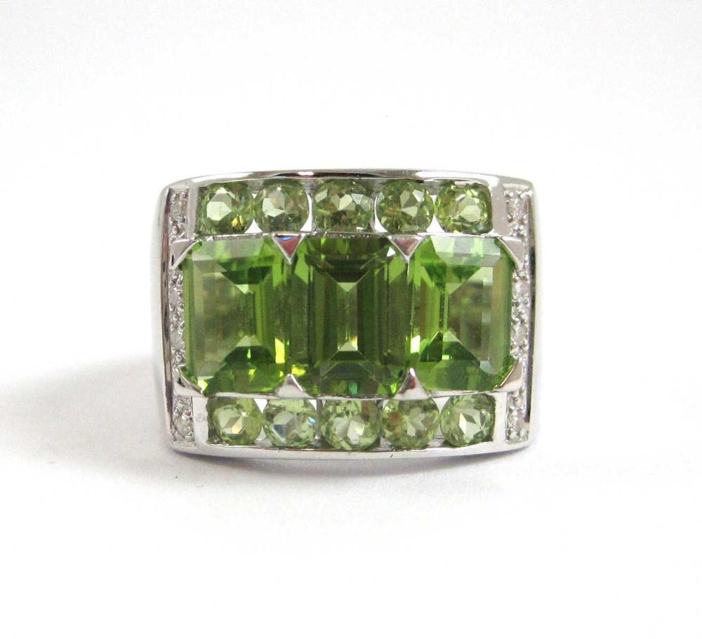 Appraisal: PERIDOT DIAMOND AND FOURTEEN KARAT GOLD RING The k white