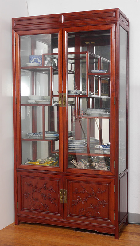 Appraisal: ORIENTAL MOTIF CURIO DISPLAY CABINET glass doors illuminated mirrored back