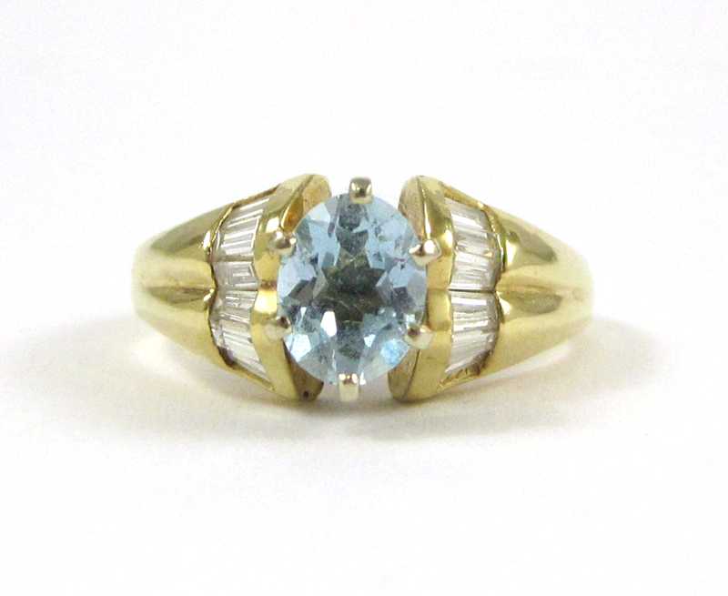 Appraisal: AQUAMARINE DIAMOND AND FOURTEEN KARAT GOLD RING with baguette diamonds