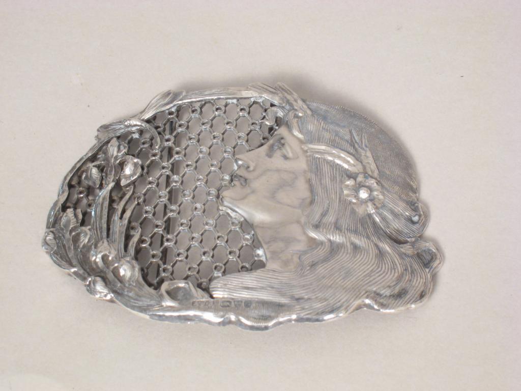 Appraisal: An Edward VII Art Nouveau Buckle with Pre-Raphaelite bust amongst