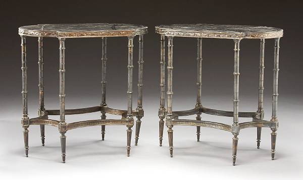 Appraisal: A pair of Neoclassical style patinated bronze and marble tables