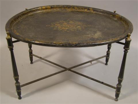 Appraisal: REGENCY STYLE OVAL BLACK AND GILT TOLE TRAY ON STAND