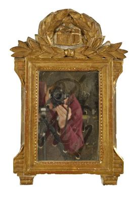 Appraisal: A th century continental giltwood wall mirror with a laurel