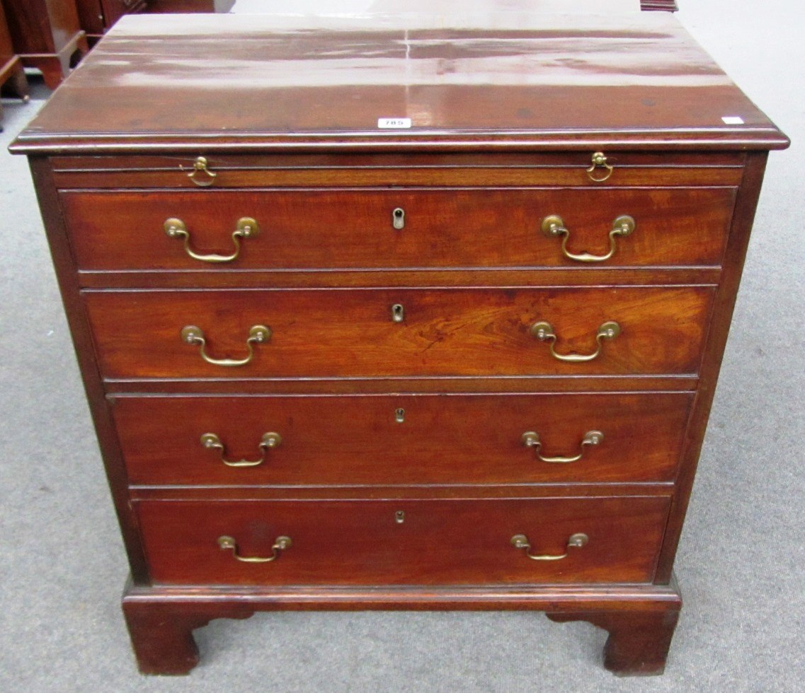 Appraisal: A mid th century mahogany small chest the brushing slide