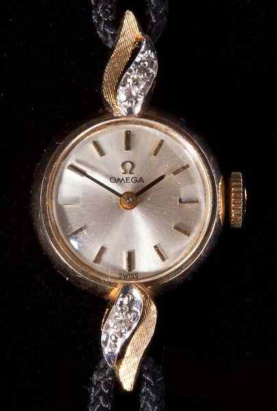 Appraisal: Vintage Lady's Wristwatch Omegamanual wind featuring round white tone face