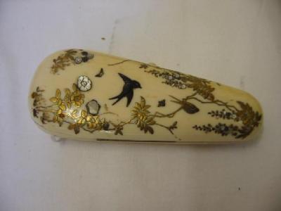 Appraisal: A MEIJI PERIOD JAPANESE IVORY SEWING CASE of rounded triangular