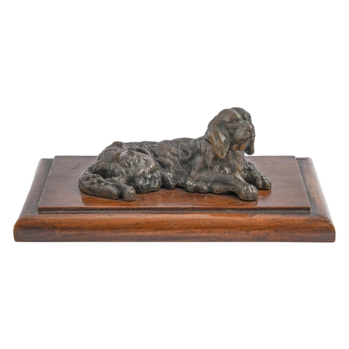 Appraisal: A bronze inkwell in the form of a recumbent spaniel