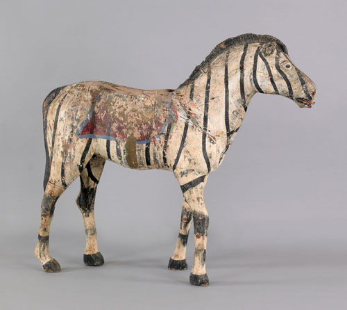 Appraisal: Carved and painted zebra carousel figure ca retaining an old