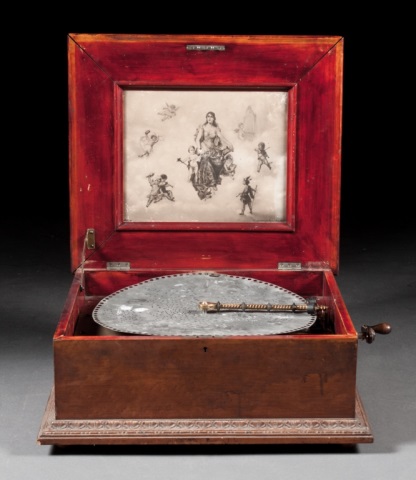 Appraisal: a Swiss bird's-eye maple disc music box late th century