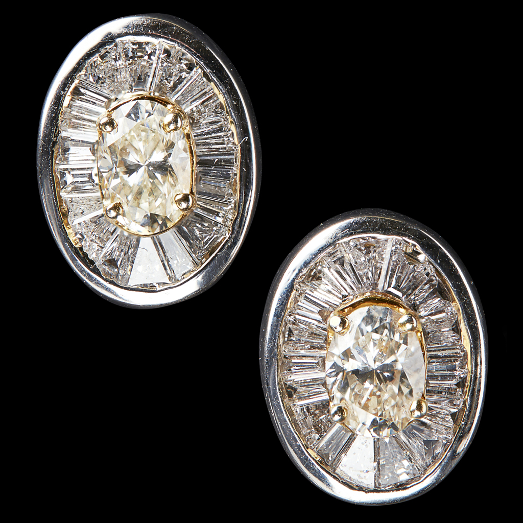 Appraisal: A pair of diamond set studs each claw set with