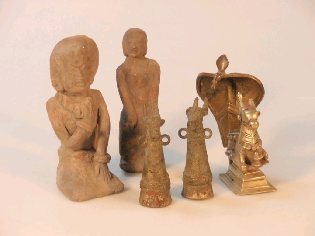 Appraisal: Two terracotta figures festival horn knots and a bronze figure