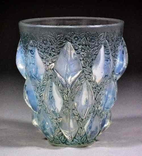 Appraisal: A Lalique opalescent glass ''Rampillon'' vase moulded in relief with