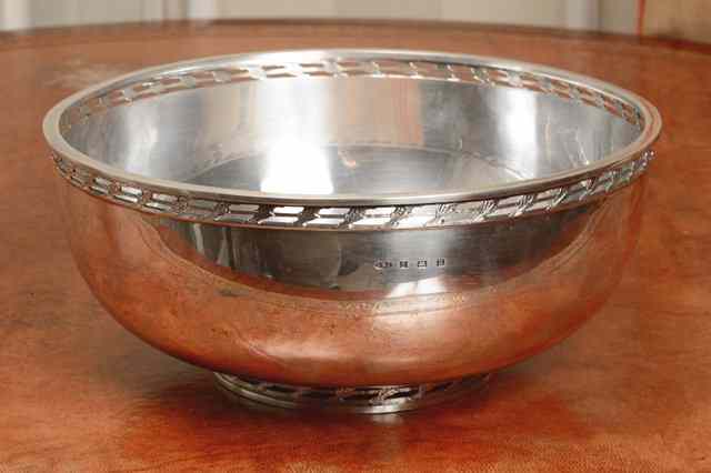 Appraisal: A SILVER PUNCH BOWL plain with pierced gallery decorated with