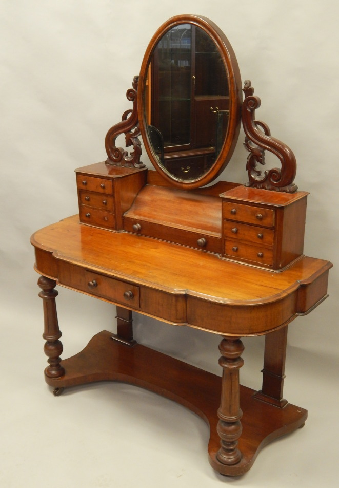 Appraisal: A Victorian mahogany Duchess type dressing table the raised back