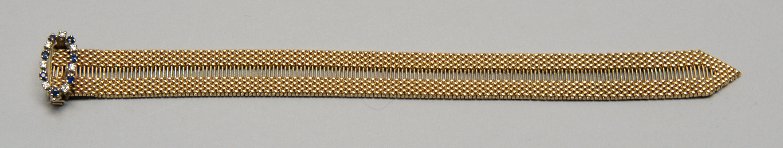 Appraisal: KT YELLOW GOLD MESH BRACELET WITH OVAL DIAMOND AND SAPPHIRE