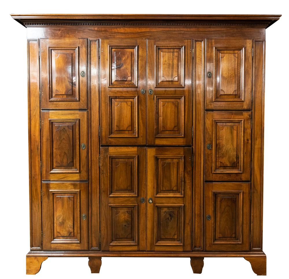 Appraisal: MICHAEL SMITH WALNUT CABINETwith two pairs of paneled doors flanked